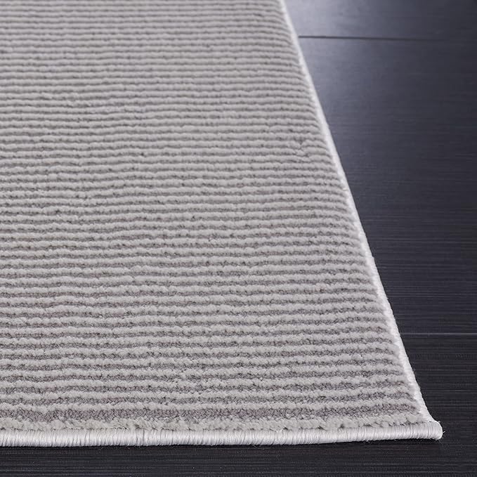 SAFAVIEH Revive Collection Area Rug - Image 2